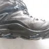 Ecco - a pair of walking boots.