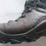 Ecco - a pair of walking boots.