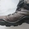 Ecco - a pair of walking boots.