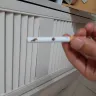 Altria Group - Hole in a cigarette - Photo 1