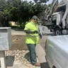 Waste Management [WM] - a garbage truck driver