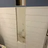 Ryan Homes - Drilled a nail into a drainage pipe when installing a toilet paper holder. - Photo 3