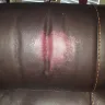 Kane's Furniture - Stain on headrest of love seat