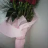 Bloomex - 10 long stem roses with a vase and card
