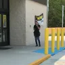 Dollar General - Staff smoking just outside front door