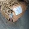 Singapore Post (SingPost) - Service. Parcel received with missing items and trash/ paper booklets inside the box. - Photo 3