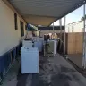 Equity Life Styles - Illegal washer/dryer recycle center operated inside park community, - Photo 2