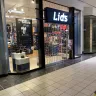 Lids.com - Customer Service, no employee on the job. - Photo 4