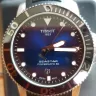 Tissot - Fluorescent bezel loom fallen out - Photo 1