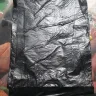 SM Supermalls - Black plastic trash bag with cross-tie