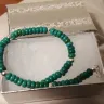 Native Indian Made - Turquoise bracelet arrived today and is a dark green bead as well as very small in size.