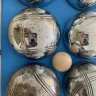 FactoryFast.com.au - Purchased deluxe boules bocce 8 alloy ball set with wooden case. Supposed to have been new but these balls were extremely tarnished