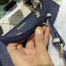 Sembonia - Damaged handbag by its own material
