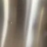Spirit Delivery & Distribution Services - Damage to my refrigerator when removing old gas stove during delivery of appliances purchased from Home Depot.  - Photo 2
