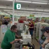 Dollar Tree - 1 cashier, line about 12 people, manager Jessica sits in office on break