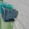 Waste Management [WM] - Waste Management trash pickup truck man  - Photo 3