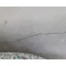 LGI Homes - Slab split from wall to wall. Water damage - Photo 1