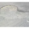 Auckland Airport - Potholes in the 15 Jimmy Ward cres. waiting area - Photo 1