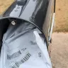 FedEx - package placed partially hanging out of USPS mailbox instead of on porch as all previous FedEx packages have been placed