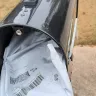 FedEx - package placed partially hanging out of USPS mailbox instead of on porch as all previous FedEx packages have been placed - Photo 1