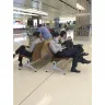 Changi Airport Group - Security Personnel taking up passenger seats