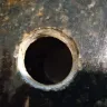Mattamy Homes - Crack in granite and plumbing installed improperly under the kitchen sink. - Photo 1