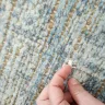 West Elm - Rug that's falling apart/coming undone
