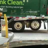 Waste Management [WM] - WM Truck blocking public parking garage exit