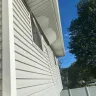 Power Home Remodeling - Soffit not nailed in and falling endangering homeowner and visitors