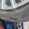 Walmart - Small screw in tire was not leaking air but took in to have removed they destroyed my tire put a big slash in the side wall of tire. - Photo 1