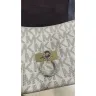 Michael Kors - Urgent complaint regarding handbag lock damage - lack of resolution - Photo 2