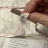 Saks Fifth Avenue - Saks refused to accept the return of a gown, saying that the security tape had been removed. - Photo 2