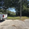 Equity LifeStyle Properties - People walking through my lot to exit and enter park through area that is not suppose to be and exit or entrance. - Photo 1