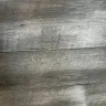 Empire Today - Vinyl flooring installed cracked chipped and rolling up - Photo 2