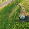 Frontier Communications - Fiber optics cable project - dug up yard, left dead grass and big hole in yard - Photo 1
