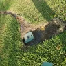 Frontier Communications - Fiber optics cable project - dug up yard, left dead grass and big hole in yard - Photo 2