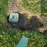 Frontier Communications - Fiber optics cable project - dug up yard, left dead grass and big hole in yard - Photo 3