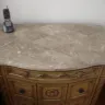 Ashley HomeStore - bad finish on the marble top of the night stand on the corners
