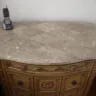 Ashley HomeStore - bad finish on the marble top of the night stand on the corners - Photo 1