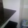 PulteGroup - poor counter top installation and faulty foyer window - Photo 1