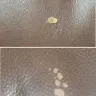 Ashley HomeStore - peeling leather - Photo 1