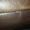Ashley HomeStore - peeling leather horrible customer service