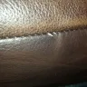 Ashley HomeStore - peeling leather horrible customer service - Photo 3