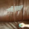 Ashley HomeStore - peeling couch/ broken tables/ popped stitching