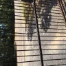 Rooms To Go - property damage to wrought iron gate - Photo 1