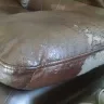 Bob's Discount Furniture - Apollo power brown leather material flaking off reclining sofa [protected] and montibello pearl marble parsons chair 225158 - Photo 2