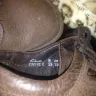 Clarks - Shoe soles fell apart.