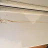General Electric - ge refrigerator is corroding and leaking through a hole in main panel of refrigerator - Photo 2