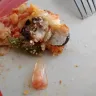 Costco - plastic chip in combo pizza - Photo 1