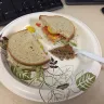 Wawa - tuna sandwich on rye with some type of paper in sandwich - Photo 3